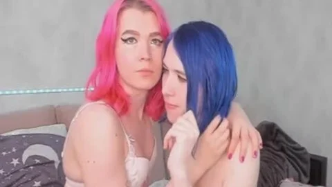 beauty tranny duett kissing whilst in nature's garb