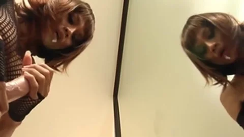 Redhead Ladyboy In darksome lingerie Sucks A fake penis By The Mirror